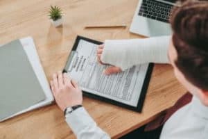 Injured man filing for workers compensation in Staunton.