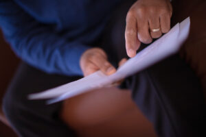 Person holding paperwork