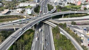 Aerial view of beltway highway in city.