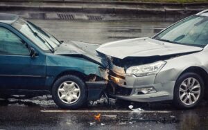 Head-on collision happening along the highway.