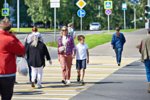 Pedestrians crossing the street.