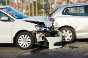 Rear-end accident happening along the highway.