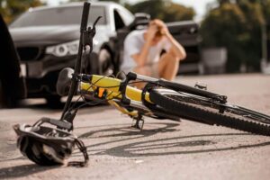 Cyclist injured from passing car.